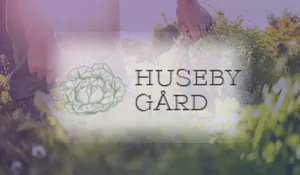 Huseby Gård med gradient (300 × 175 px)
